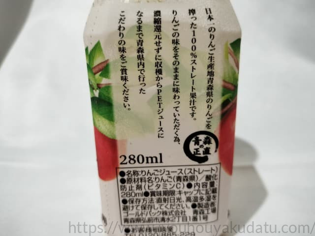 パッケージの側面に記載された「商品説明・こだわり」のクローズアップ写真。「青森県産りんごを100%使用し…」といった説明文が読める。
